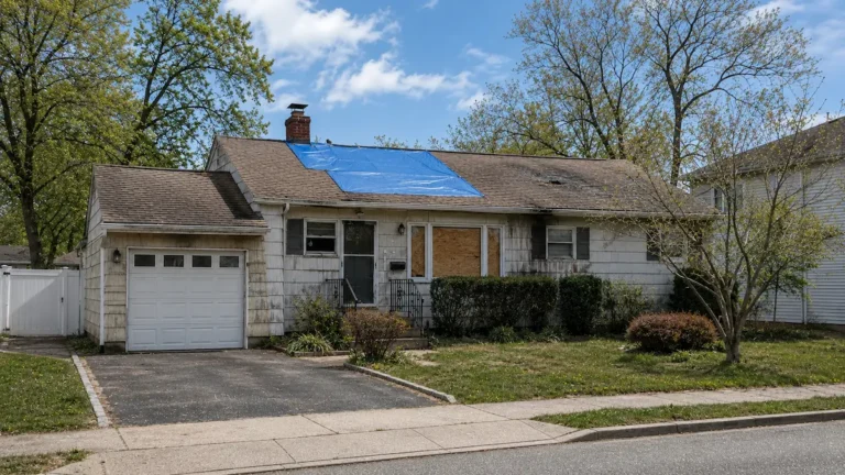 we buy houses Long Island NY fire water storm damage